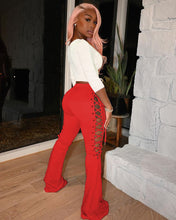 Load image into Gallery viewer, Hot selling solid color eyelet flared trousers